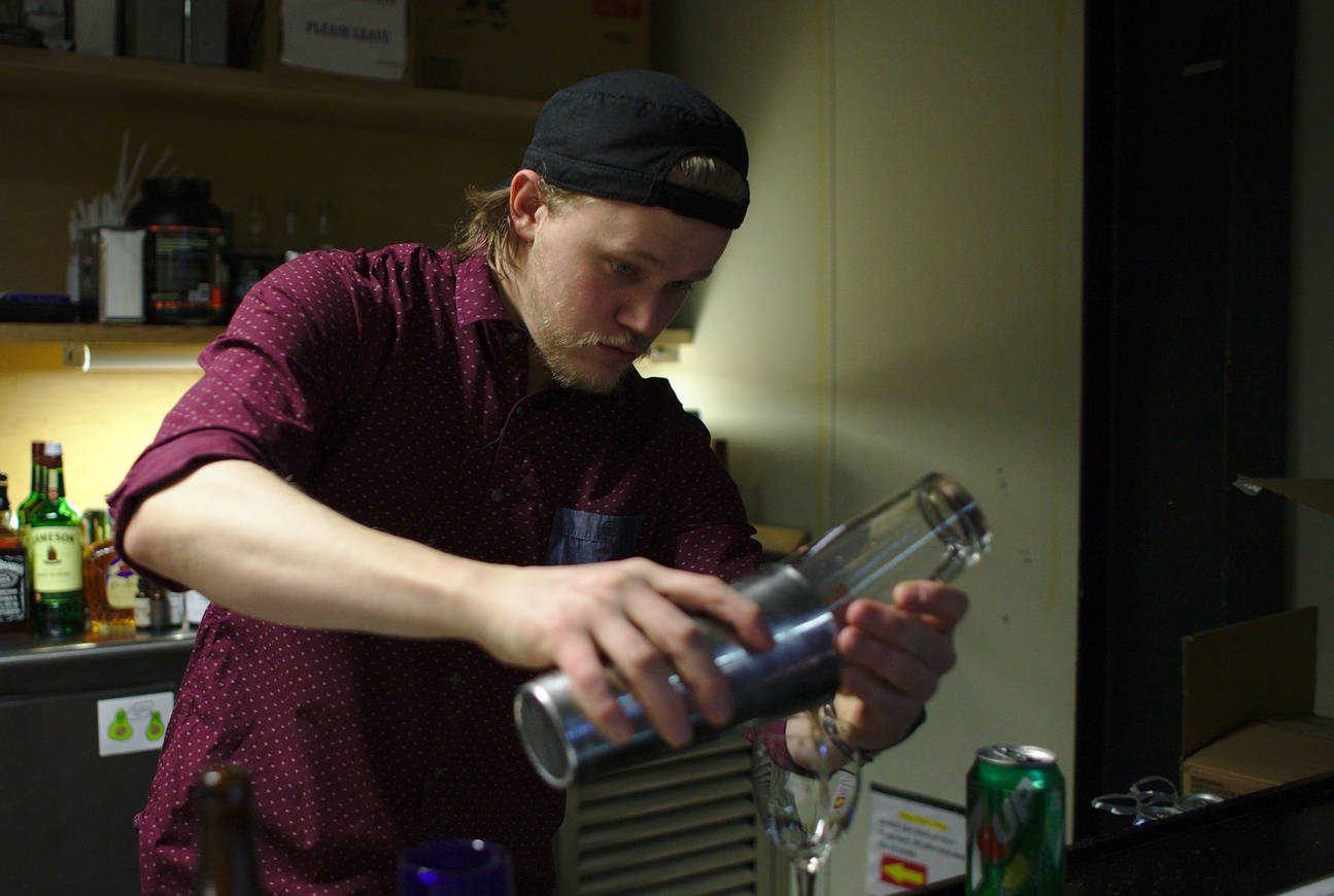 Viktor demonstrating his cocktail talents at the pre-dinner bar